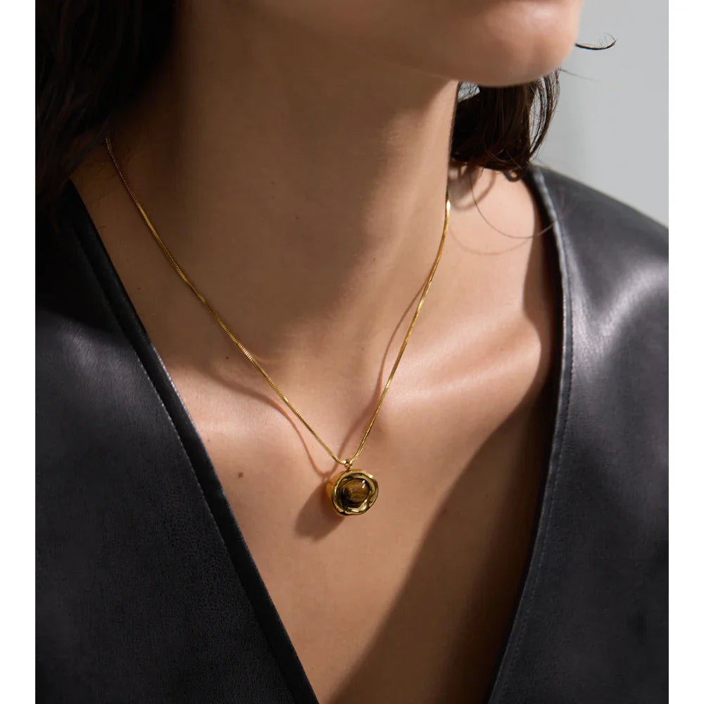 Original on-model view of irregular gold tiger-eye pendant necklace