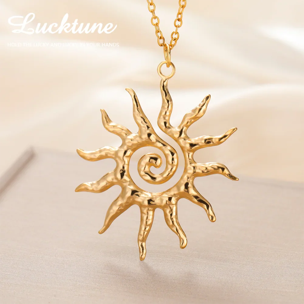 Original close view of gold textured spiral sun pendant necklace