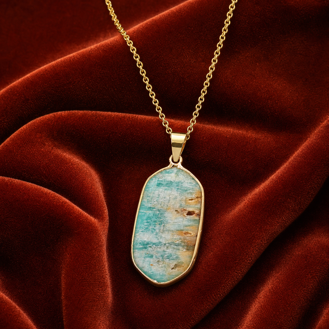 Amazonite geometric pendant on rust velvet