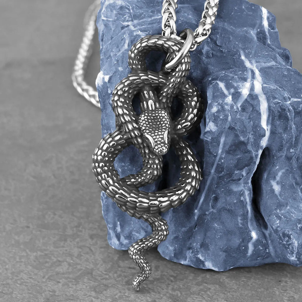 Original listing view of the coiled snake pendant