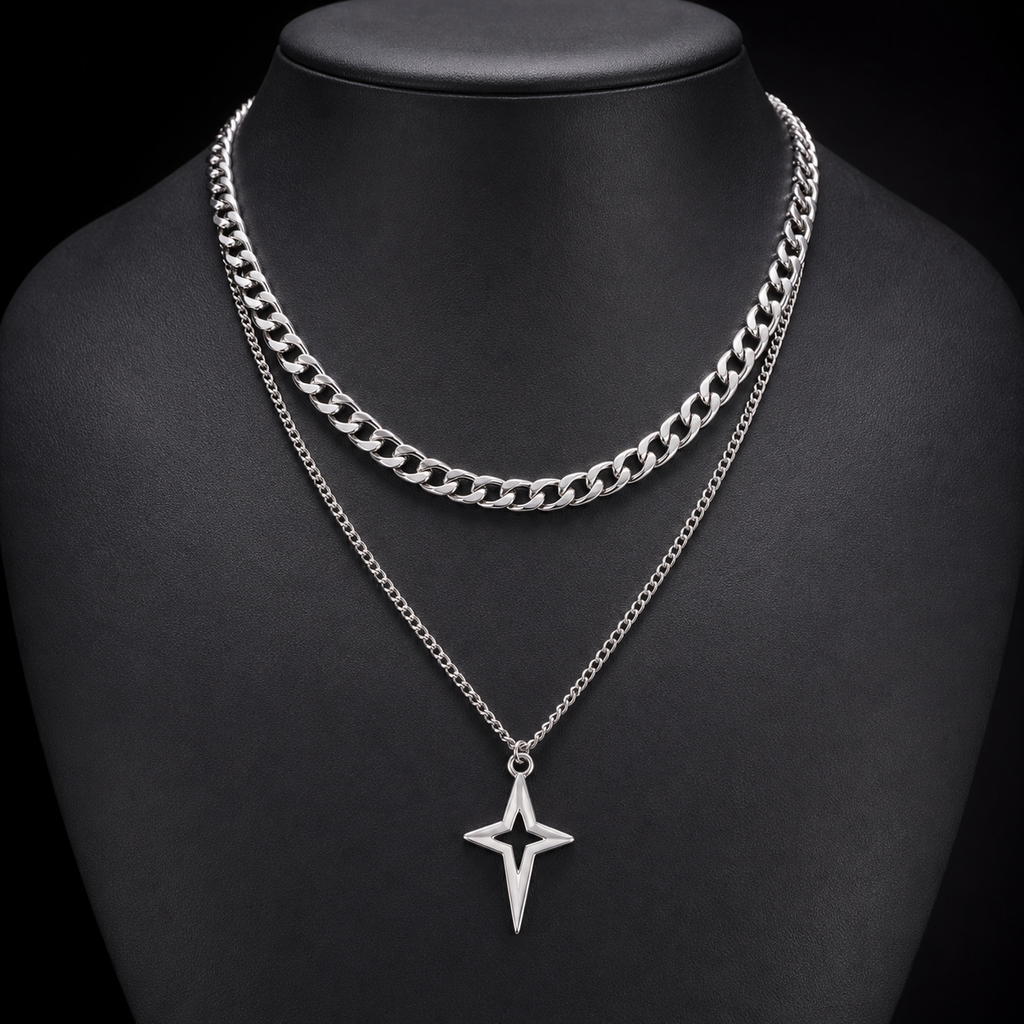 Silver double-layer Cuban star necklace on charcoal bust