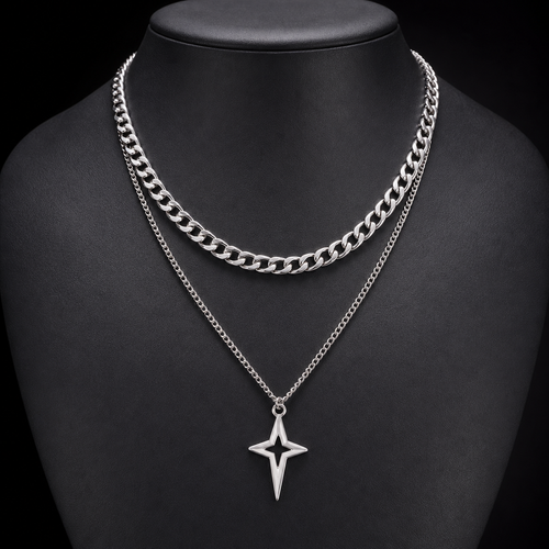 Silver double-layer Cuban star necklace on charcoal bust