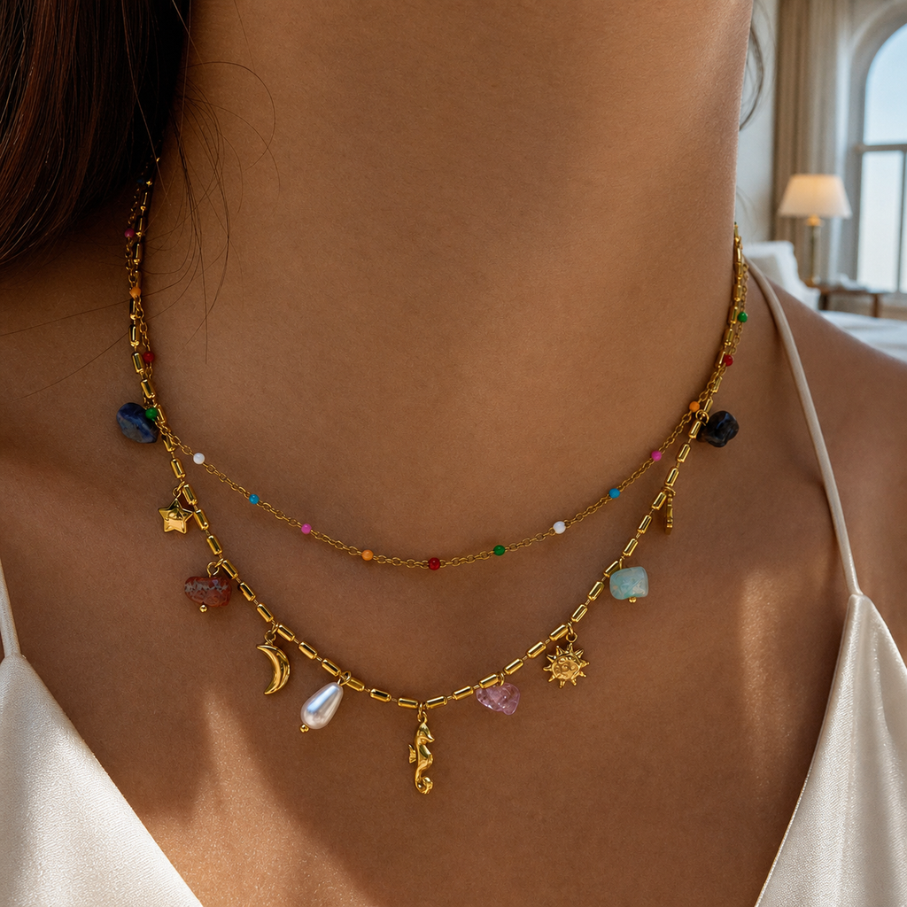 Natural-stone celestial layered necklace worn in boutique hotel