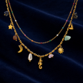 Natural-stone celestial layered necklace on midnight velvet