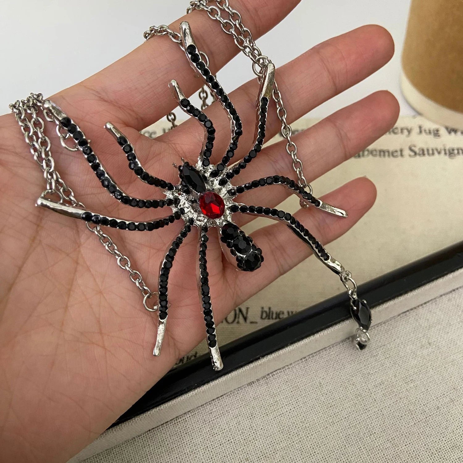 Layered gothic spider necklace gemstone and chain detail