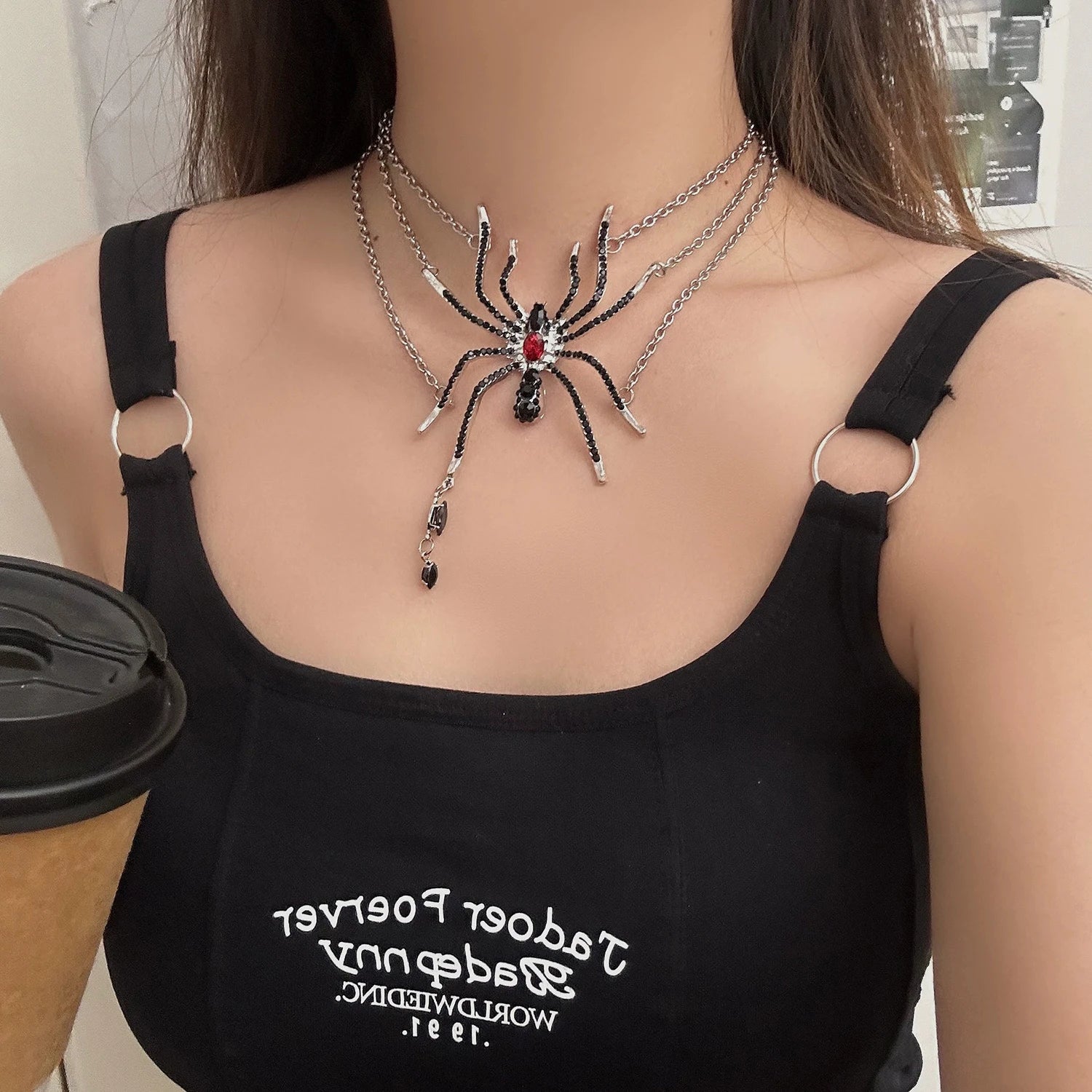 Layered gothic spider statement necklace on-model product photograph
