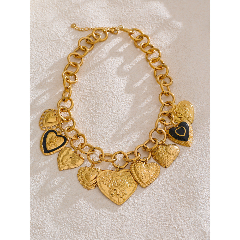 Original styled view of gold multi-heart charm statement necklace