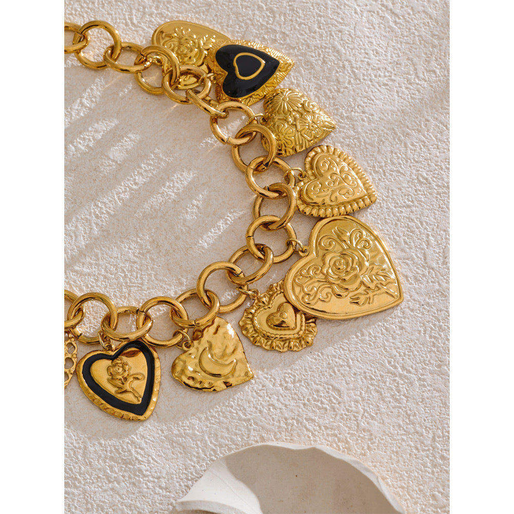 Original close detail of embossed heart charms