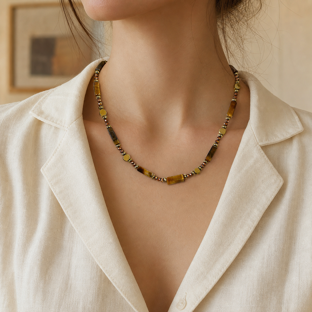 Tiger-eye beaded chain worn with cream linen